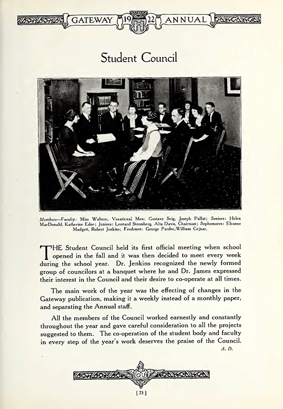 Members of the Student Council and faculty advisors sit around a table.