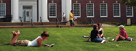 students lounging in the pep bowl in front of arts & sciences hall