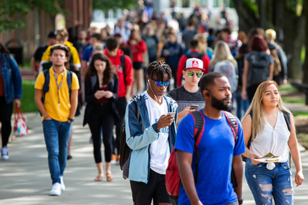 students walking on campus