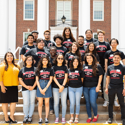 Group of summer scholars posing as a group in front of Arts and Sciences Hall