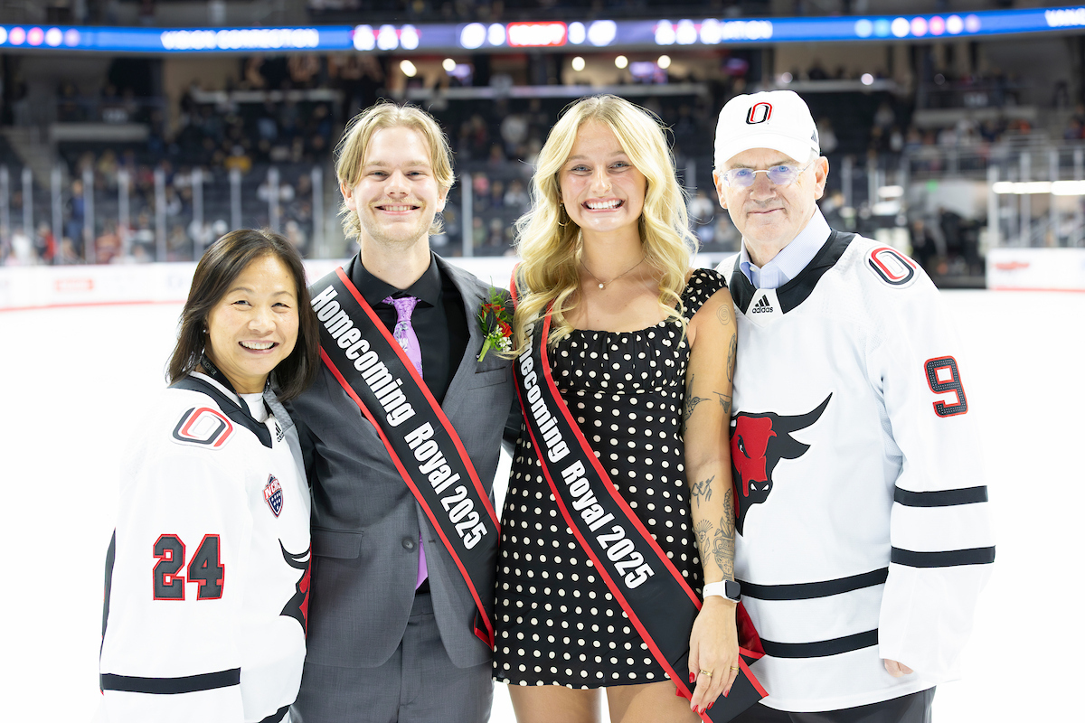 Homecoming royalty posing with Chancellor Li and the University of Nebraska President, Dr. Jeffrey Gold.