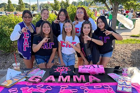 Sigma Lambda Gamma tabling at MavFest 2022