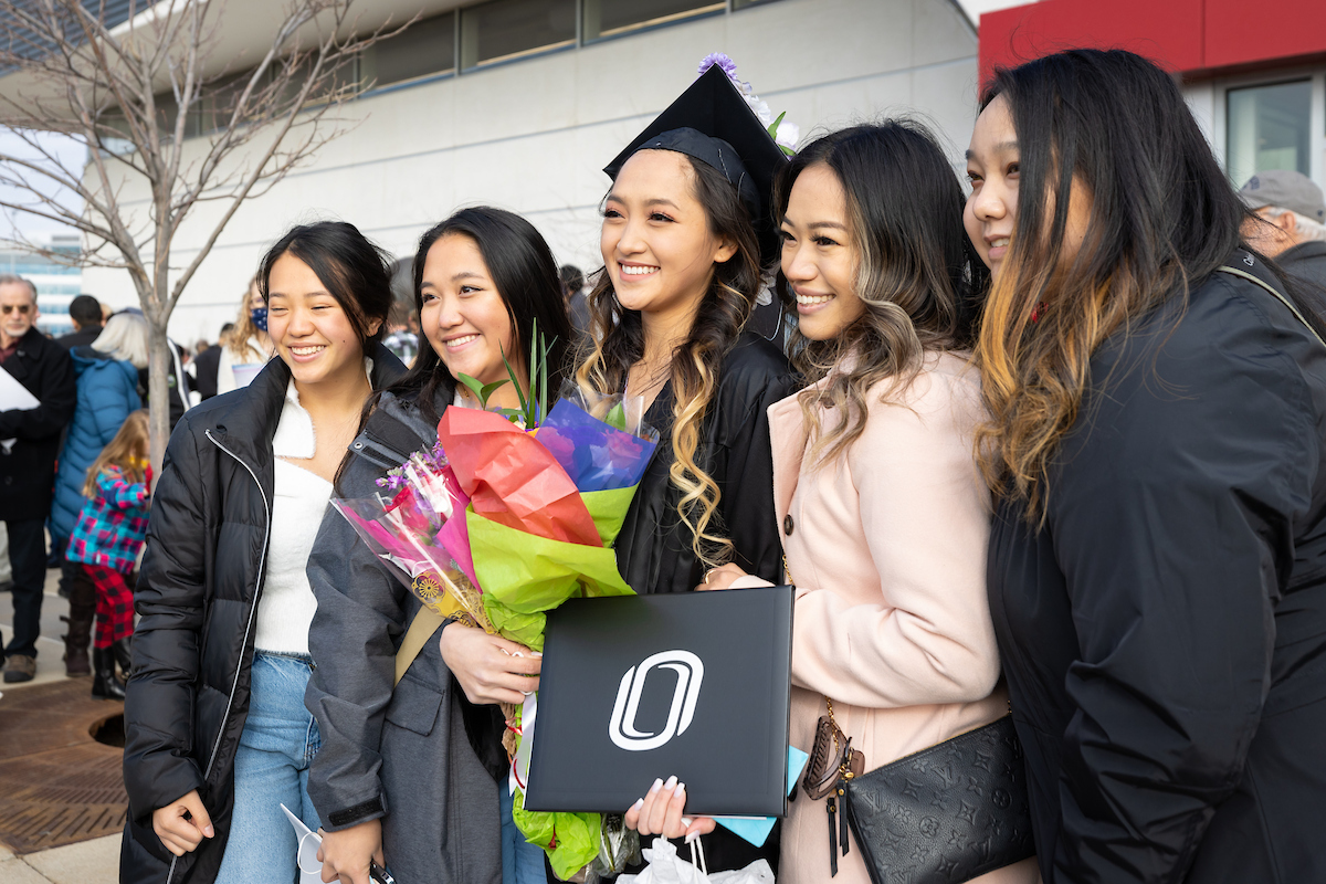 Family supporting student at UNO Graduation