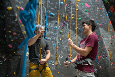 students rope climbing