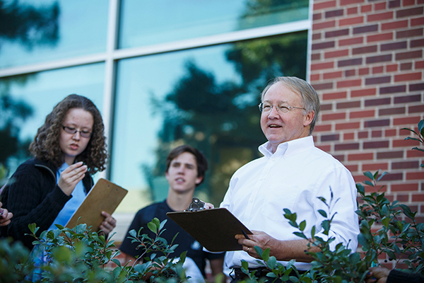 Steve Rodie teaching students outside