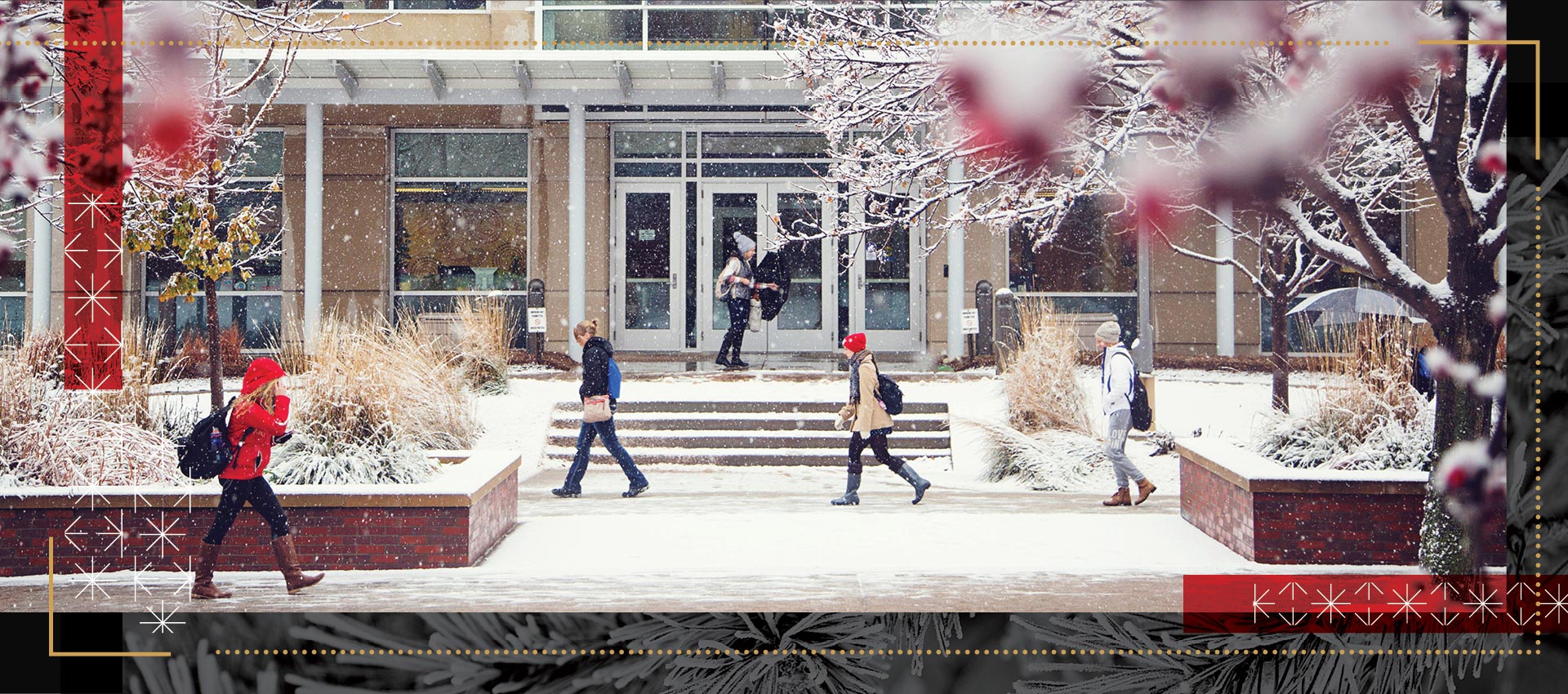 Student walking on campus in the snow