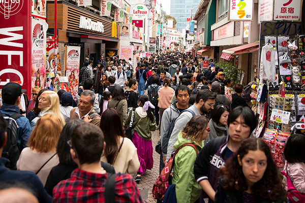 People pack the streets in the Harajuku neighborhood of Tokyo, Japan
