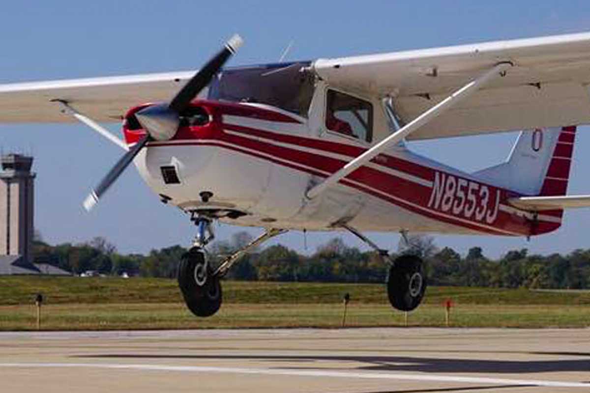 A UNO-branded small airplane takes flight