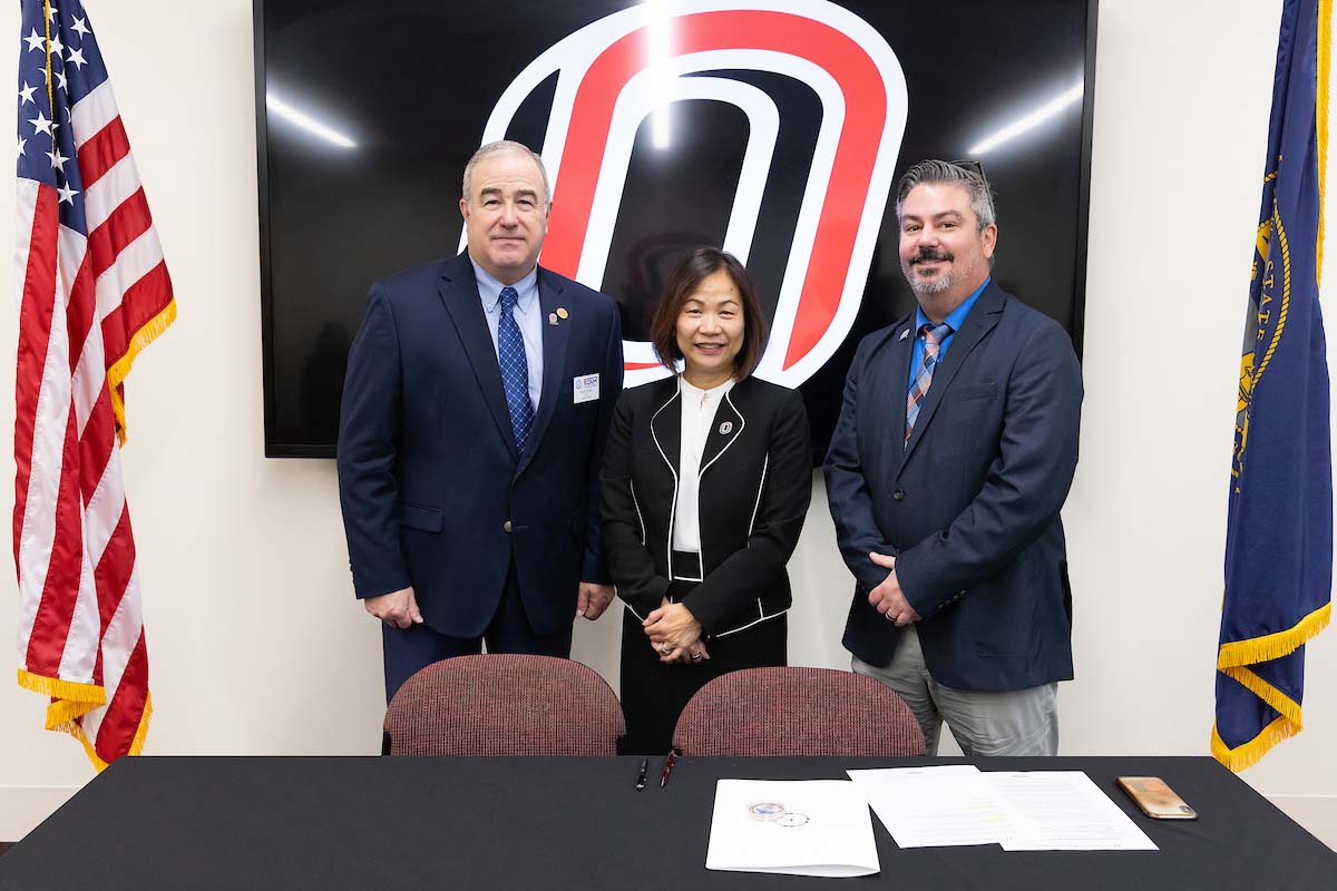 (from left) Maj. Gen. (Ret.) Rick Evans; Chancellor Joanne Li, Ph.D., CFA; and Harley Barmore, Ph.D., director of UNO's Military-Connected Resource Center.