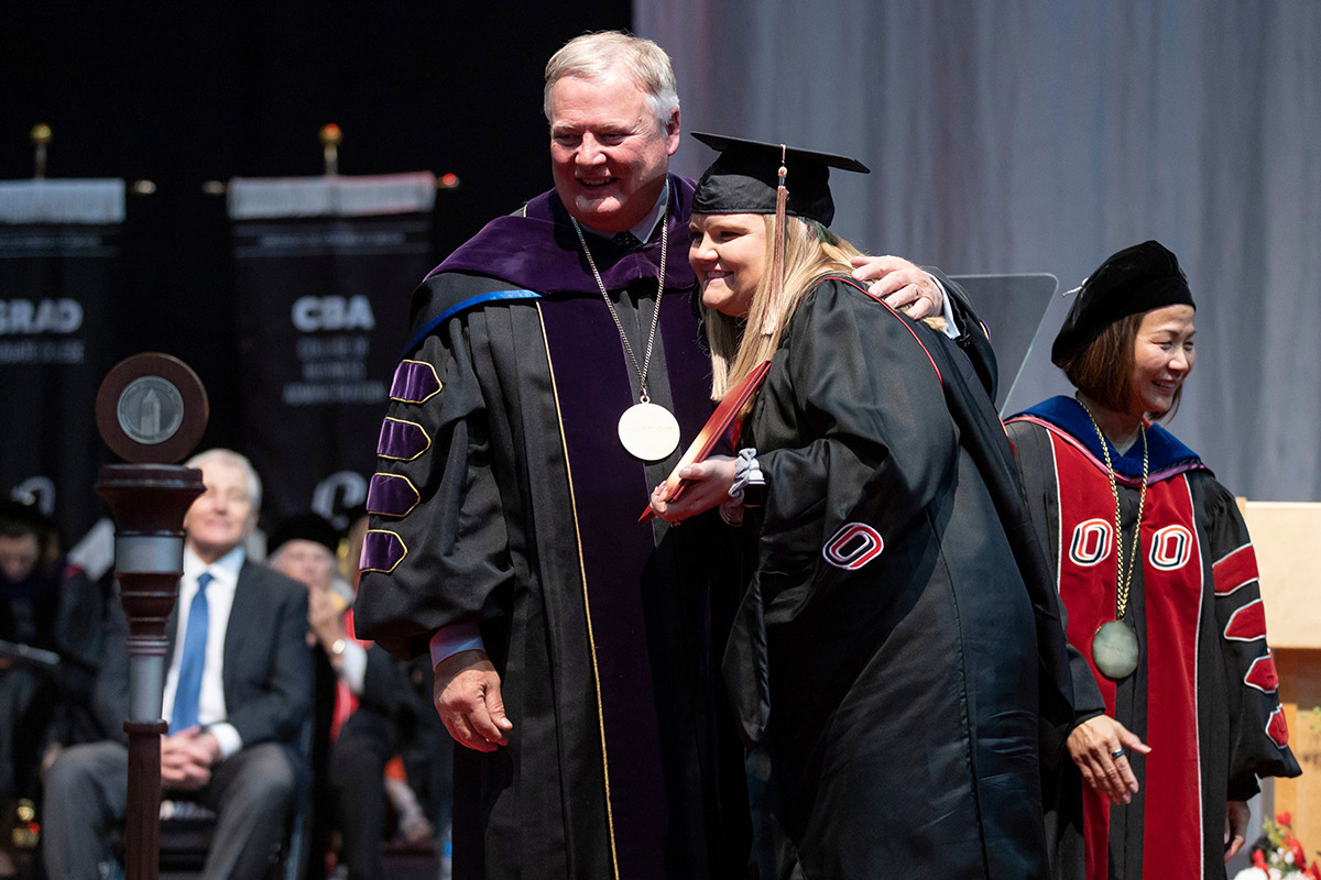 In May 2023, UNK Chancellor Doug Kristensen, J.D., celebrated his daughter Paige's graduation from UNO.
